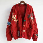 Kabelgebreid Vest met Unieke Patchwork Details