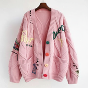 Kabelgebreid Vest met Unieke Patchwork Details