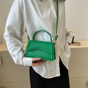 Elegante Lederen Dames Handtas met Golvend Detail