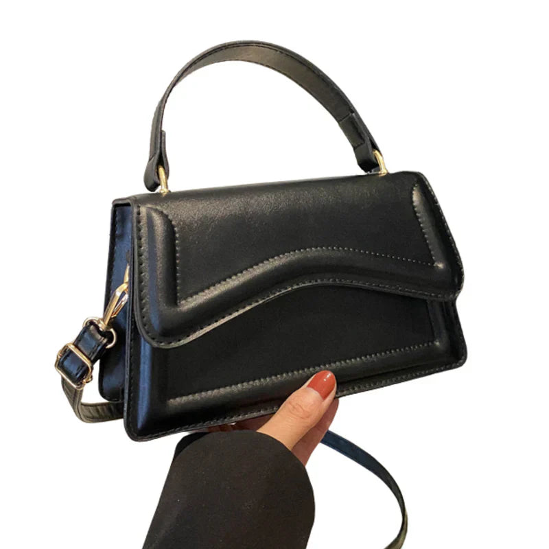 Elegante Lederen Dames Handtas met Golvend Detail