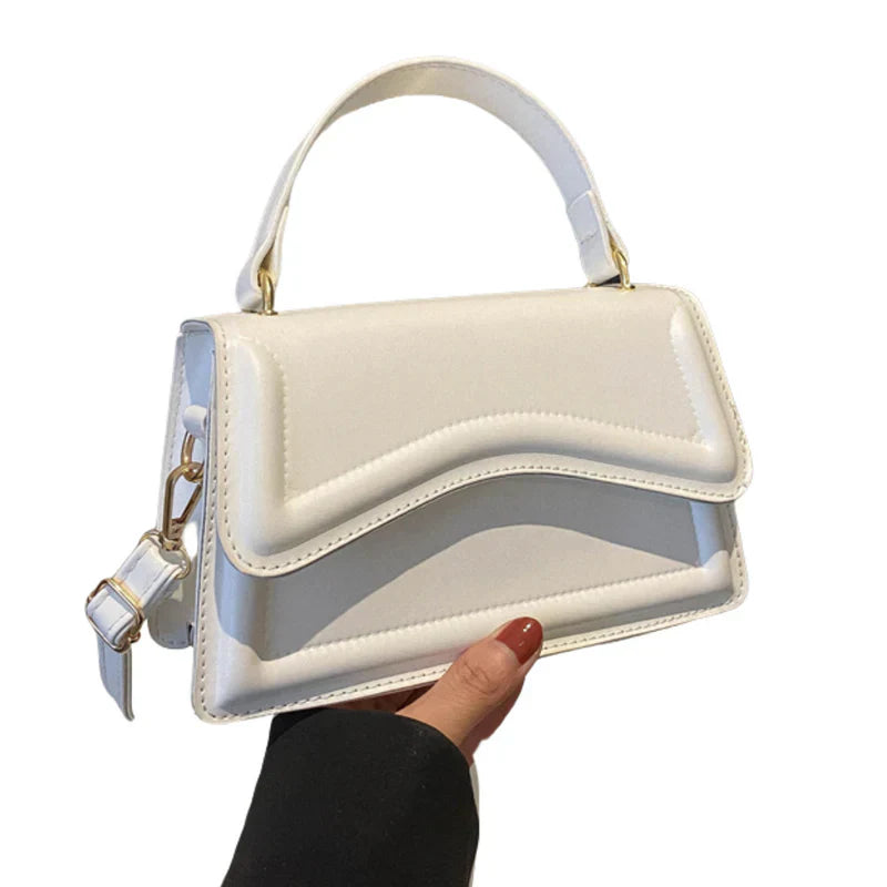 Elegante Lederen Dames Handtas met Golvend Detail