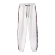 Trendy Tweedelig Dames Trainingspak met Luipaardprint Accenten