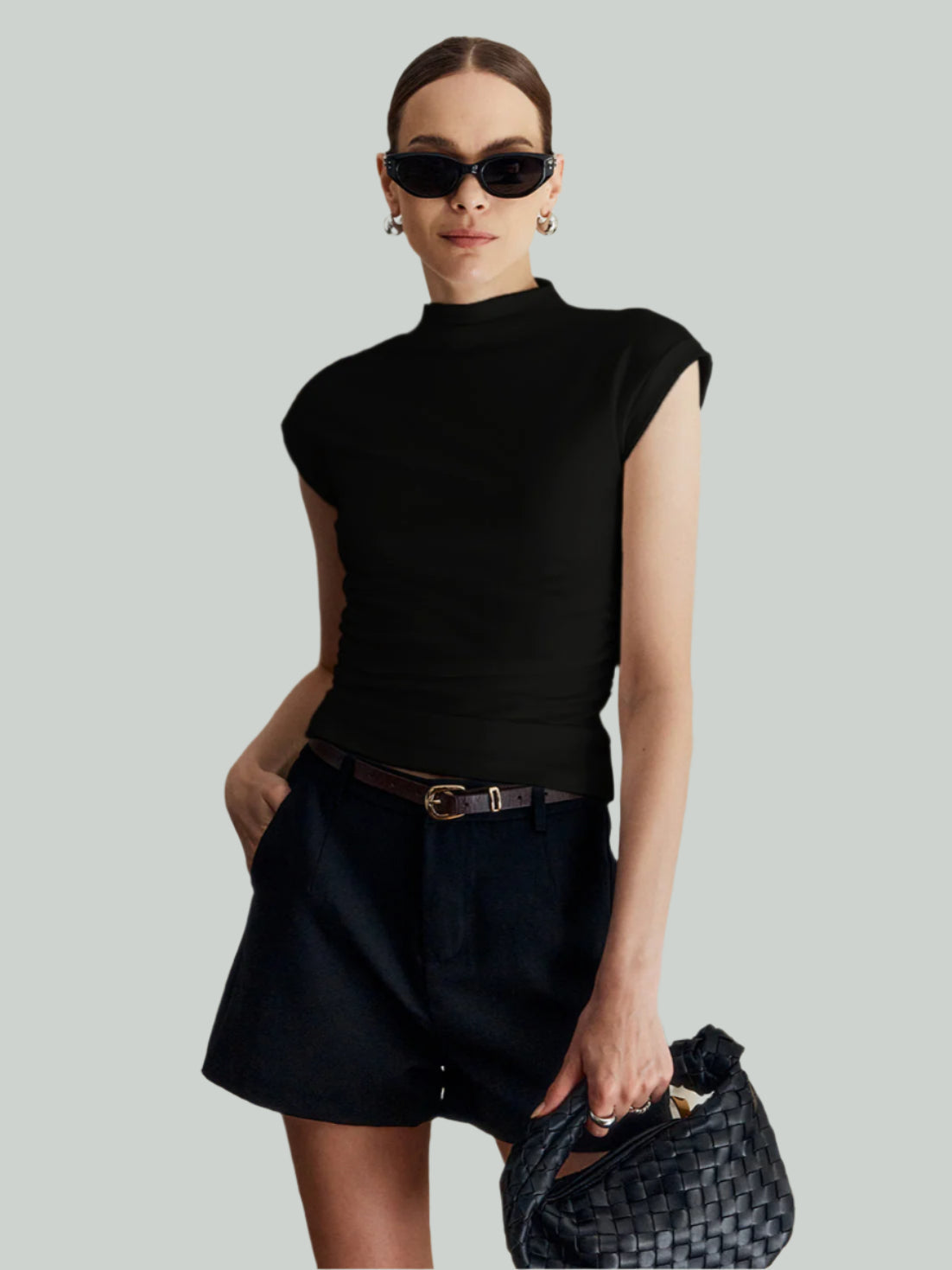 Mouwloos Dames Topje met Hoge Kraag – Elegant en Veelzijdig