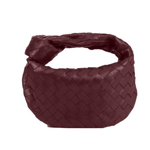 Borsa a mano intrecciata in pelle marrone scuro, design elegante e moderno, accessorio di moda per donna, perfetta per ogni occasione.