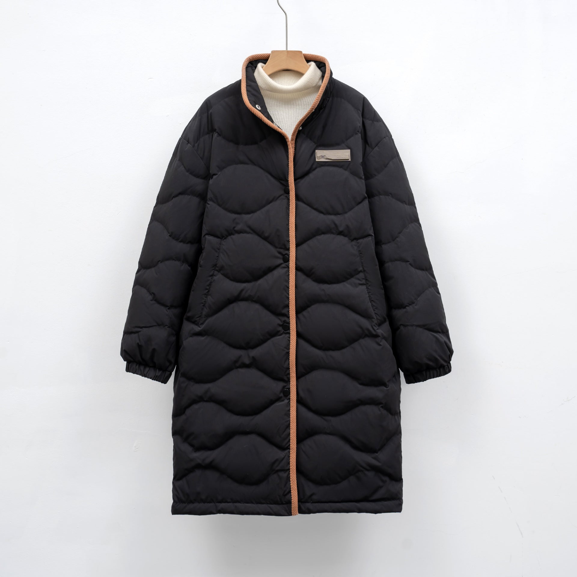 Lange Dames Winterjas – Gewatteerde Jas met Golvende Stiksels